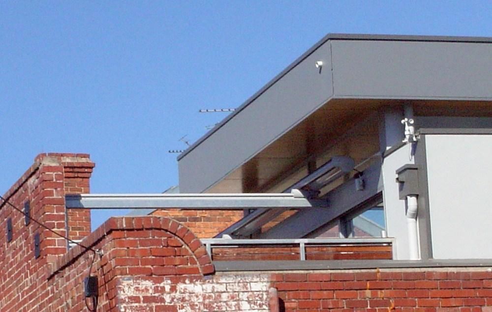 W7 Conservatory Awning retracted over an outdoor area