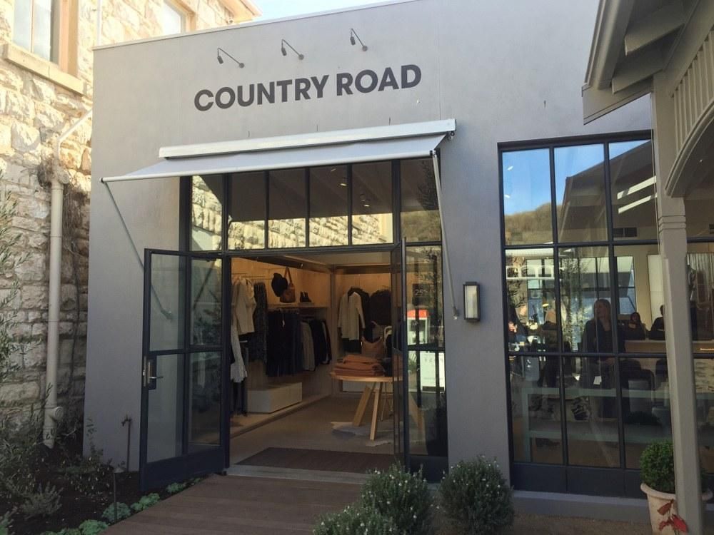 Drop arm awning installed on Country Road's storeforont in Melbourne