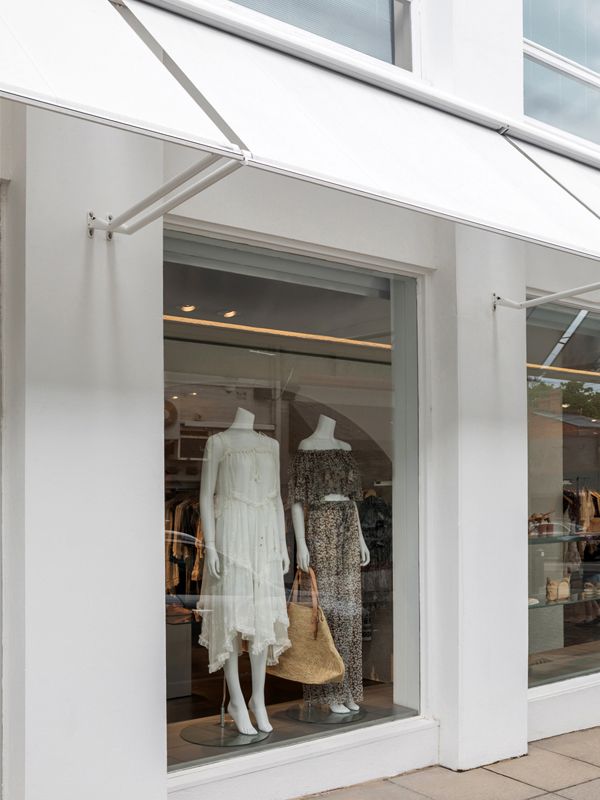 Drop arm awning at a store front in Zimmermann in Armadale