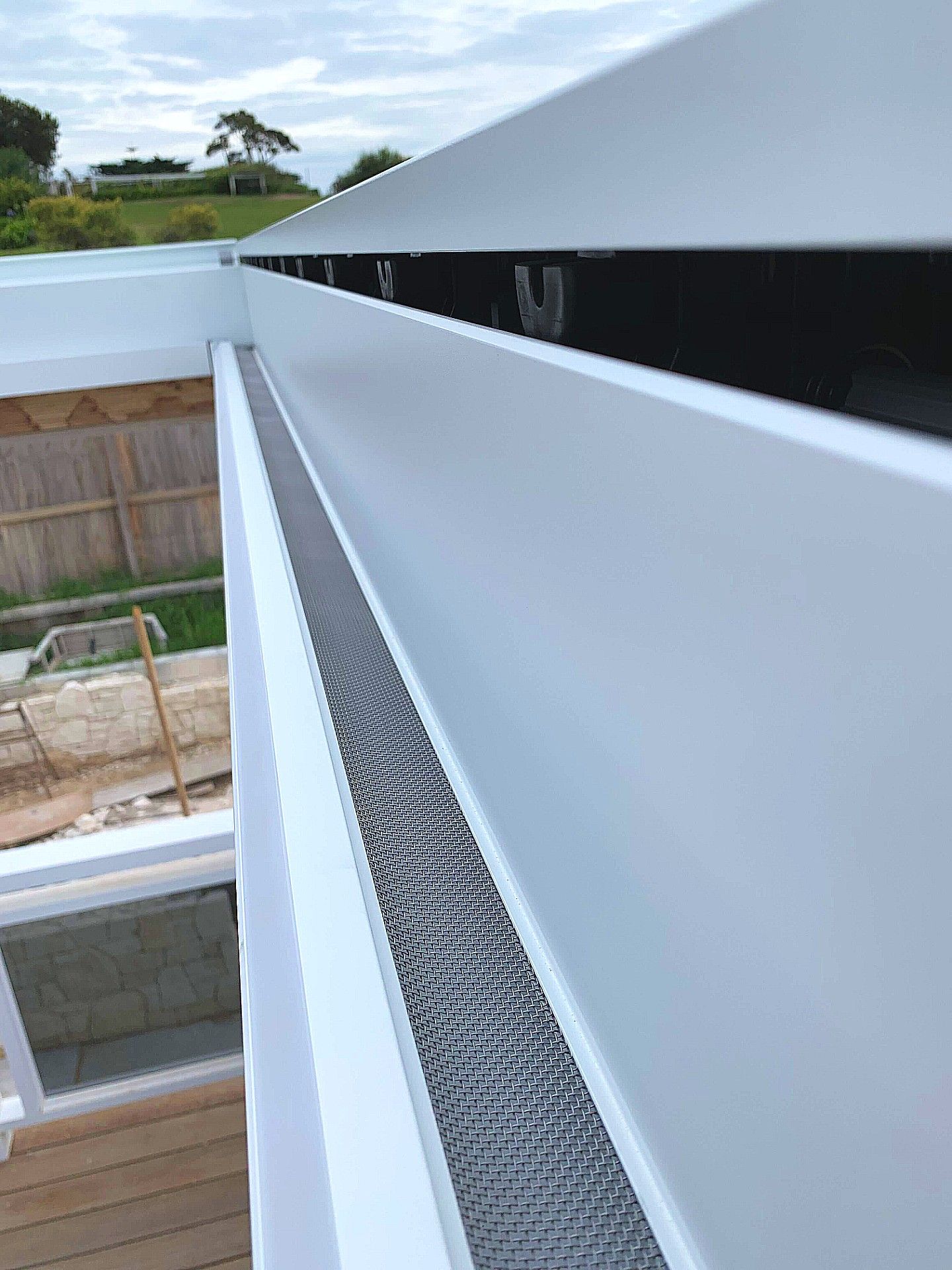 Stainless steel mesh lines the gutters to prevent build up