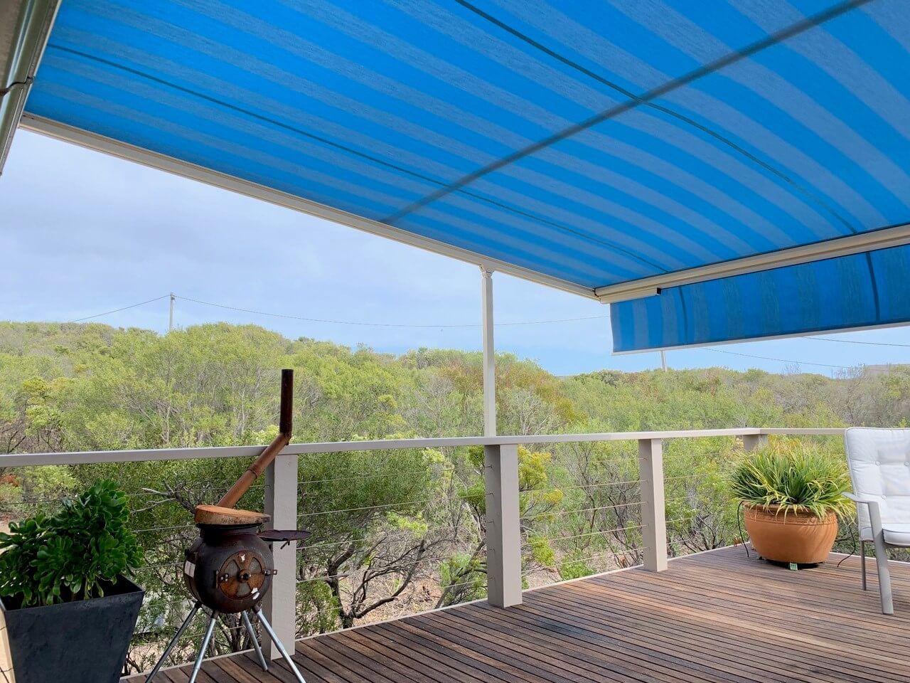 P40 Pergola Awning extended to shade a large outdoor area
