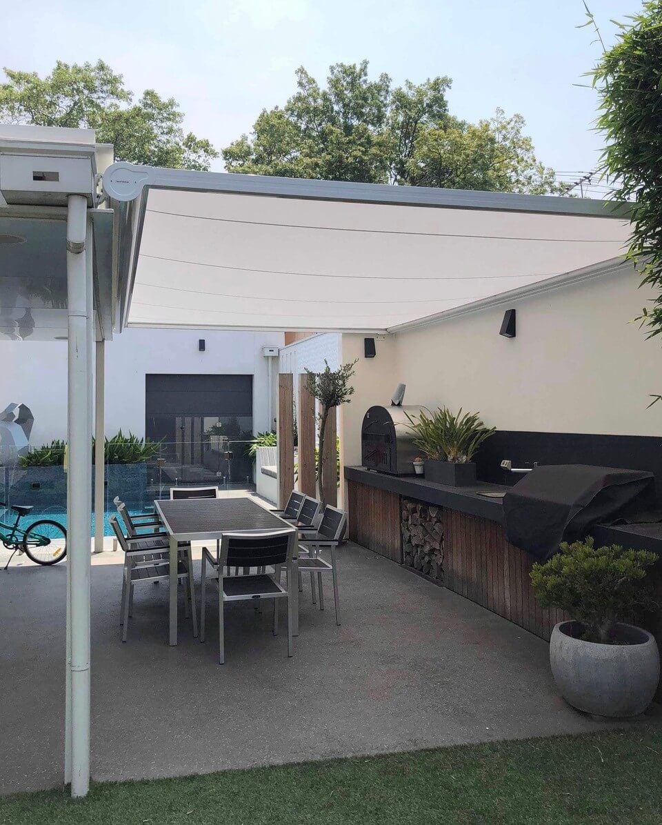 P40 Pergola Awning covering a residential BBQ area